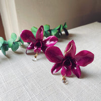 Plum Orchid with Quartz Crystal
