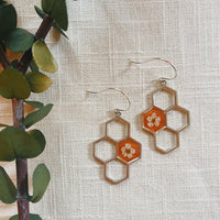 Spirea on Sparkling Orange Honeycombs