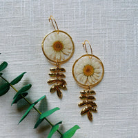 White Daisy with polished Gold Leaf Dangle